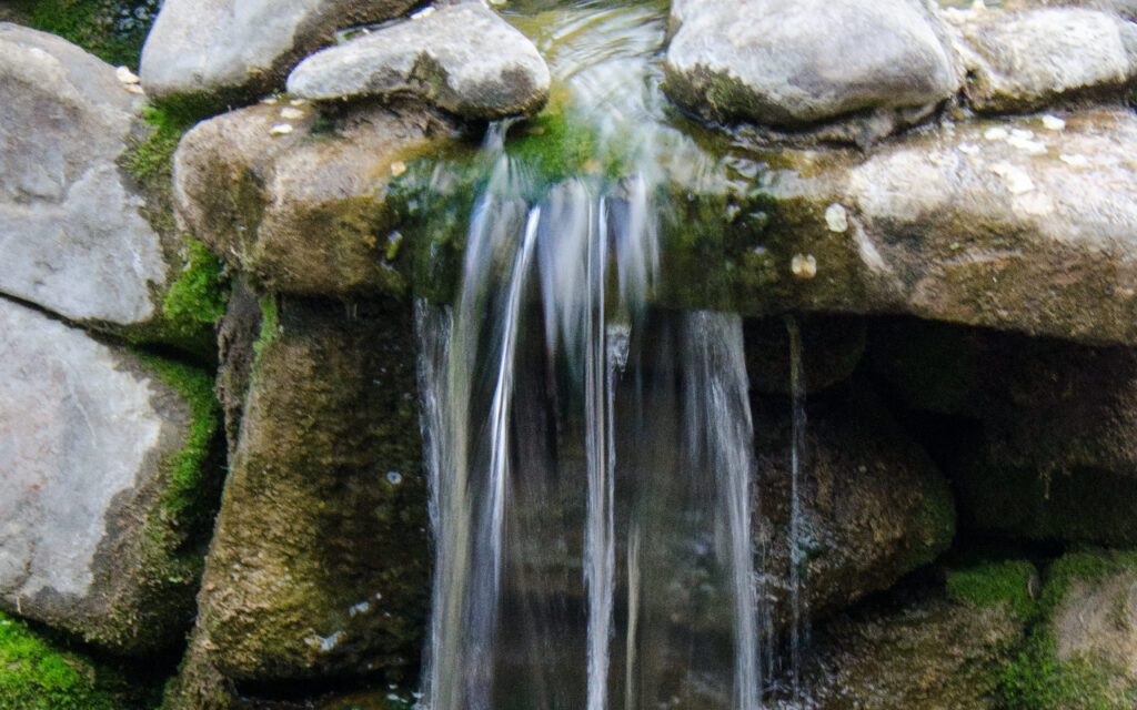 water feature waterfall fountain in rock garden