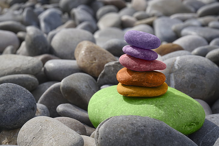 balanced colored rocks